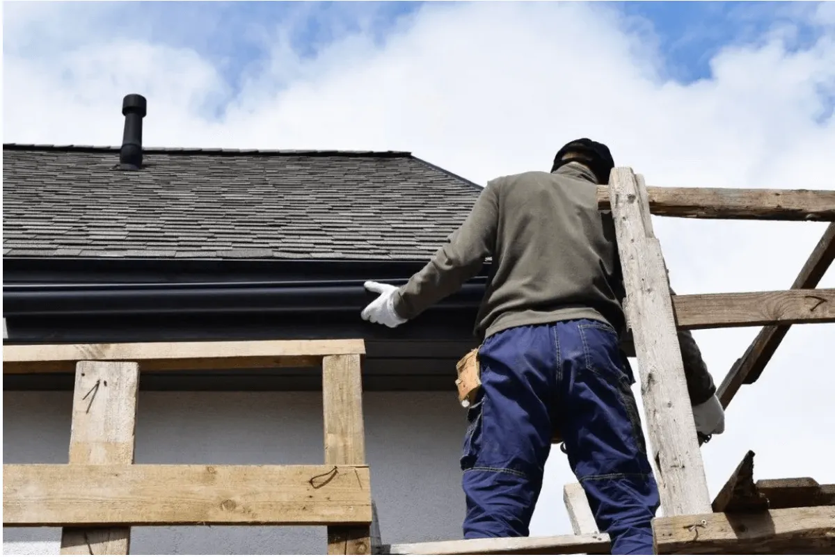 Gutter installation process on a Hartford home