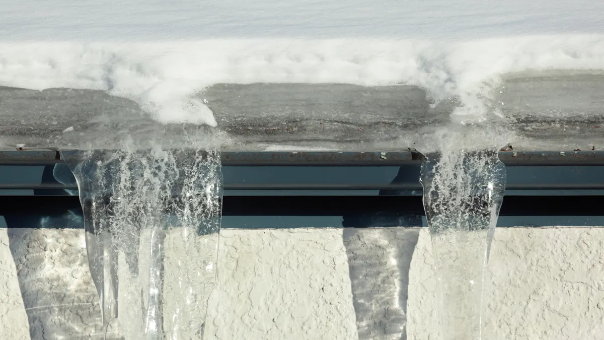 Ice dam formation on a Hartford roofline